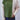 Two-tone women's chunky knit bomber jacket featuring a stylish winter design. The jacket is shown in a neutral grey color, highlighting its textured knit fabric with a focus on the shoulder, collar, and sleeve detailing. The outerwear provides a cozy fit with a defined waist, perfect for winter fashion.