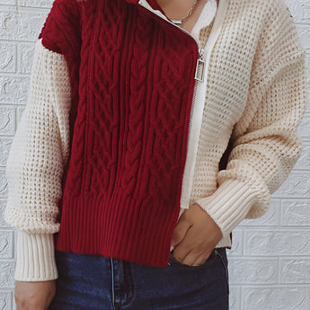 Two-tone chunky knit bomber jacket for women, designed for winter fashion, featuring a stylish and warm knit pattern. The jacket is shown in a neutral color palette, suitable for one size, highlighting its versatility and unique texture.