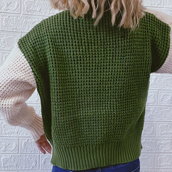 A stylish two-tone chunky knit bomber jacket for women, featuring a winter fashion design with a grey color palette. The jacket highlights distinct outerwear elements such as a defined collar, long sleeves, and a fitted waist, emphasizing texture and comfort.