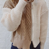 Two-tone chunky knit bomber jacket for women featuring a stylish winter design with a blend of grey hues. The jacket showcases a comfortable fit with long sleeves, a prominent neckline, and a cozy texture suitable for cold weather fashion.