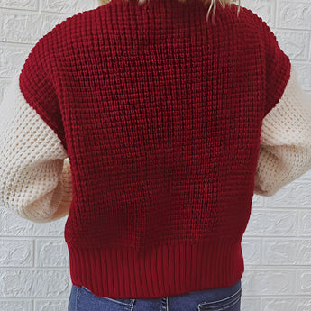 Two-tone women's chunky knit bomber jacket featuring a combination of white and grey colors, with long sleeves and a cozy, fashionable design suitable for winter wear.