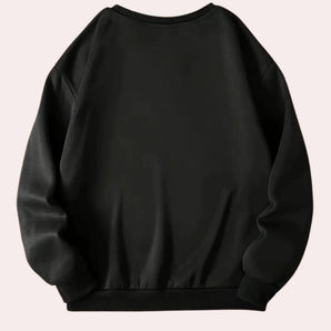 Unisex black crewneck sweatshirt with long sleeves and classic design, featuring a versatile pullover style.