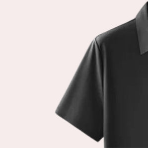 Unisex black minimalist t-shirt with short sleeves and a round collar, showcasing a seamless design.