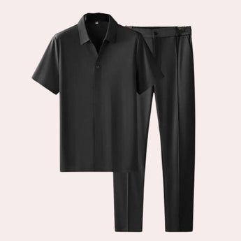 Unisex black minimalist t-shirt in size 4XL, featuring a seamless design with short sleeves and a simple collar, made from soft, jersey fabric for a versatile and essential addition to any wardrobe.