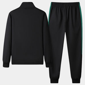 Unisex black turtleneck tracksuit set featuring a sleek design with green stripe joggers, showcasing a comfortable and stylish sportswear look.