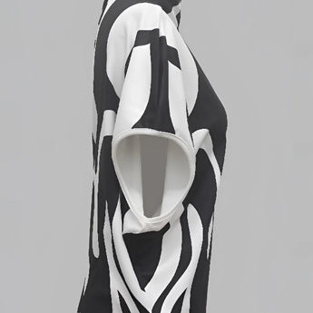 Unisex black and white geometric art hoodie showcasing modern streetwear style with bold geometric patterns.