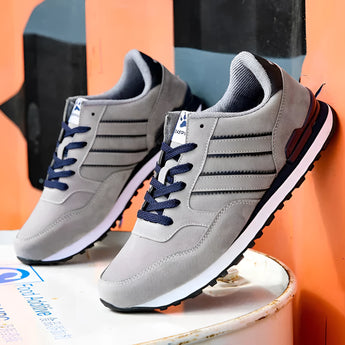 Unisex grey suede low-top sneakers featuring a stylish urban design, suitable for walking and cross-training, size 45 in gray.