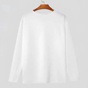 Unisex lightweight long-sleeve crewneck white t-shirt hanging on a clothes hanger.