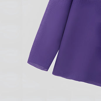 Unisex lightweight long-sleeve crewneck white t-shirt displayed against a plain background, highlighting the garment's textile material and sleeve design.