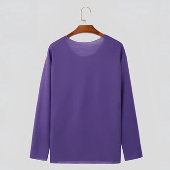 Unisex lightweight long-sleeve crewneck white t-shirt on a hanger, showcasing the simple and versatile design with a classic crewneck and long sleeves.