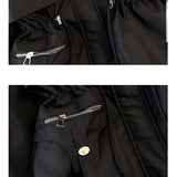 Urban style black leather jacket featuring silver zippers, adjustable waist, and a structured collar with long sleeves.
