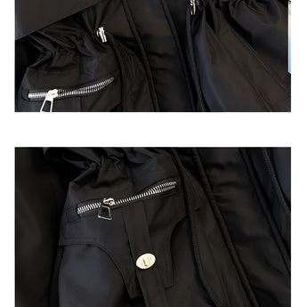 Urban style black leather jacket featuring silver zippers, adjustable waist, and a structured collar with long sleeves.