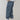 Men's oversized cargo pants in electric blue with multiple pockets, designed for an urban style, emphasizing the waist, thighs, and knees.