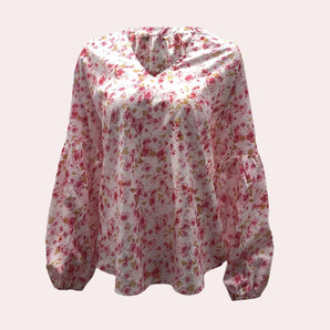 V-neck boho pink floral blouse for women with long sleeves, featuring an elegant spring design with a magenta and peach color pattern.
