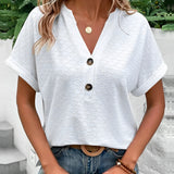 White short sleeve V-neck blouse in size 3XL with buttoned front and stylish design.