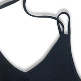 Versatile sleeveless maxi dress with pockets in a summer casual beachwear style, displayed with fashion accessories and a hobo bag.