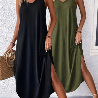 Versatile sleeveless maxi dress with pockets shown on a model, perfect for summer casual beachwear, featuring a relaxed fit, a round neckline, and a flowing skirt.