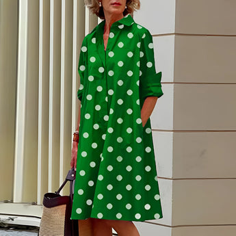 Vibrant asymmetric fuchsia and orange color block dress with a tailored fit, featuring a unique one-piece design. The dress includes a structured shoulder, a stylish collar, and long sleeves, accentuating the waist for a flattering silhouette. Fashion-forward and eye-catching, suitable for a bold statement look.