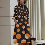 Vibrant asymmetric fuchsia and orange color block dress with orange polka dots, featuring stylish sleeves, designed for a bold and fashionable look, shown in size 4XL.