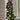 Vibrant asymmetric dress with fuchsia and orange color block design, featuring green polka dot pattern, long sleeves, and a flattering waistline; suitable for events and fashionable settings.
