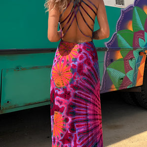 A vibrant backless Bohemian maxi dress in a psychedelic tie-dye print, predominantly featuring rich red wine hues, displayed in an XL size.