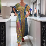 Vibrant yellow ethnic print kaftan dress in size 3XL, featuring a loose, flowing design with sleeves, perfect as a bohemian beach cover-up.
