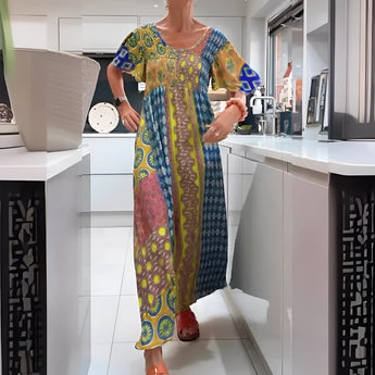 Vibrant yellow ethnic print kaftan dress in size 3XL, featuring a loose, flowing design with sleeves, perfect as a bohemian beach cover-up.