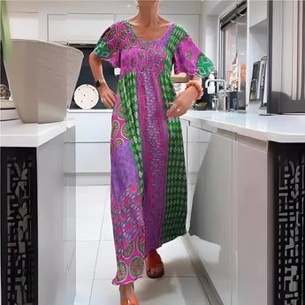 Vibrant ethnic print kaftan dress in pink featuring a flowing one-piece design with wide sleeves, a round neckline, and a loose fit suitable for a 3XL size, ideal as a bohemian beach cover-up.