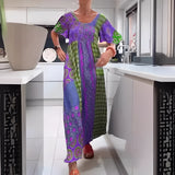 Vibrant purple kaftan dress with an ethnic print, featuring a loose-fitting design with a V-neckline and wide sleeves, styled as a bohemian beach cover-up in a 3XL size.