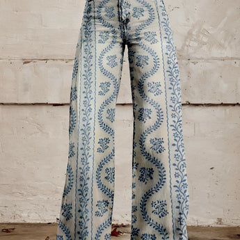 High-waist wide-leg denim bell-bottom jeans with vibrant floral print, blue patterned, size 5XL.