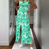 Vibrant green wide-leg jumpsuit for women in a casual summer style, featuring a loose fit with a defined waist, short sleeves, and a round neckline, shown in size 3XL.