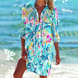 Tropical blue 3XL tie-dye beach cover-up featuring a colorful boho tunic design with short sleeves and a relaxed waist, ideal for summer outings by the water.