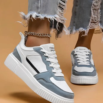 Vintage blue suede high sole sneakers for women, featuring a retro fashion design with a sturdy sole, perfect for walking and outdoor activities. The sneakers combine a classic and sporty look with a hint of grey and silver accents.