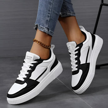 Vintage blue suede high sole sneakers for women with a retro fashion style, shown in a Nero color variant, size 43. The sneakers are displayed on a surface with visible black and white elements.