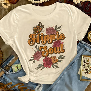 A white vintage Bohemian T-shirt featuring a floral butterfly design, embodying a hippie soul style with a casual and cool fashion appeal. The T-shirt is short-sleeved and showcases intricate patterns.