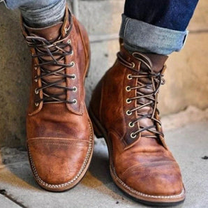 Vintage men's brown leather lace-up boots, artisan crafted and durable, shown in size 43.
