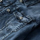 Vintage men's dark wash distressed denim jacket in classic trucker style, displayed on a white background with visible distressed detailing and high-quality denim material.