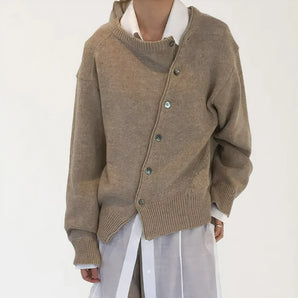 Vintage oversized wool cardigan in brown, featuring a chunky knit design with a button-up front and collar. Suitable for a unisex style and available in size 2XL.
