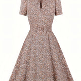 Vintage polka dot floral print A-line midi dress in pink, size 2XL, featuring a sleeveless design with a fashion-forward pattern suitable for casual or formal occasions.