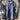Vintage striped blue and white dungarees in a retro style, featuring a one-piece jumpsuit overall design, made from denim fabric. The garment is in a size 3XL, showcasing a blend of azure and white stripes for a classic and fashionable look.