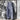 Vintage dark blue and white striped dungarees in a retro jumpsuit overall style, displayed on a clothes hanger.