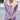 Purple sherpa-lined winter jacket with a cozy collar, long sleeves, and a snug fit, designed for warmth and style.