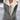 Warm women's gray winter jacket with sherpa lining, featuring a fashionable design with a collar, full sleeves, and tailored joints for enhanced thermal insulation.
