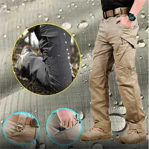 Water-resistant tactical cargo pants featuring a durable, quick-dry, anti-tear fabric, shown in an outdoor setting.