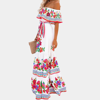 Elegant watercolor floral silk maxi dress in pastel colors, featuring delicate sleeves and a fitted waist, in size XL.