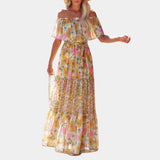 
A pastel watercolor floral silk maxi dress in yellow, featuring a flowing design perfect for spring and summer. The dress is an XL size, showcasing a one-piece garment with a flattering waist, stylish neckline, and elegant sleeves. Ideal for daytime events, the dress highlights the shoulders and arms, exuding a light and airy feel.