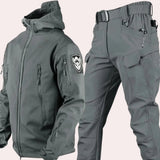 Waterproof hooded tactical jacket and cargo pants set in gray, size 4XL, featuring a durable design suitable for outdoor activities with intricate details such as a secure collar, adjustable waist, and ample pocket space for functionality.