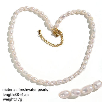 Waterproof hypoallergenic pearl choker necklace featuring elegant beach-inspired design with natural materials and delicate body jewelry elements.