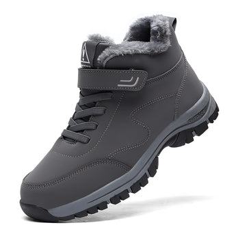 Waterproof grey insulated winter hiking boots with fur lining, designed for outdoor activities and walking.