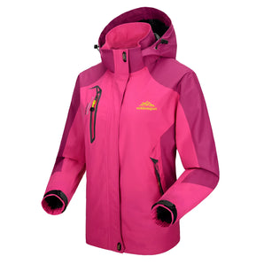 Waterproof pink women's insulated ski jacket with full sleeves and a high collar, featuring breathable and windproof material.